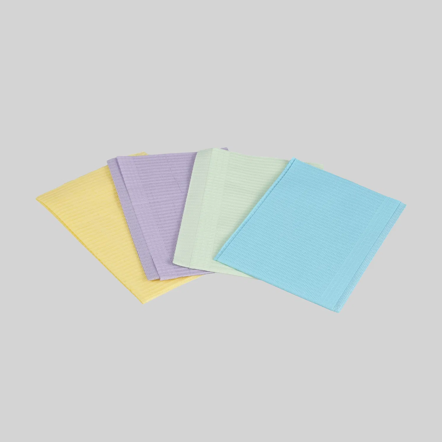 Material desechable médico Bufanda dental Babero de color Toalla de almohadilla dental